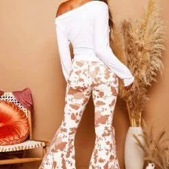 Purple Door Boutique Ladies' Brown Cow Print Flared Jeans